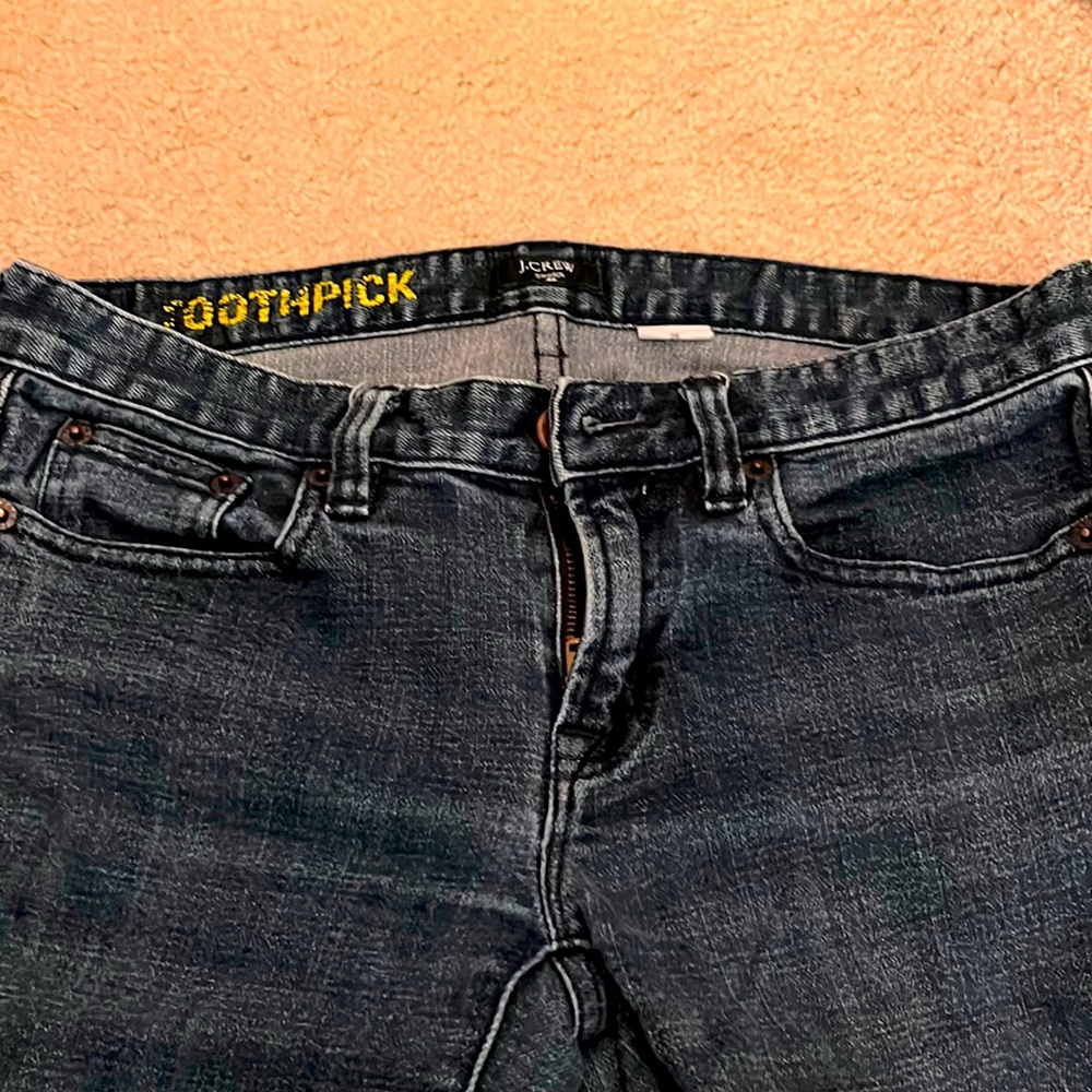 Toothpick J Crew dark wash skinny jeans.